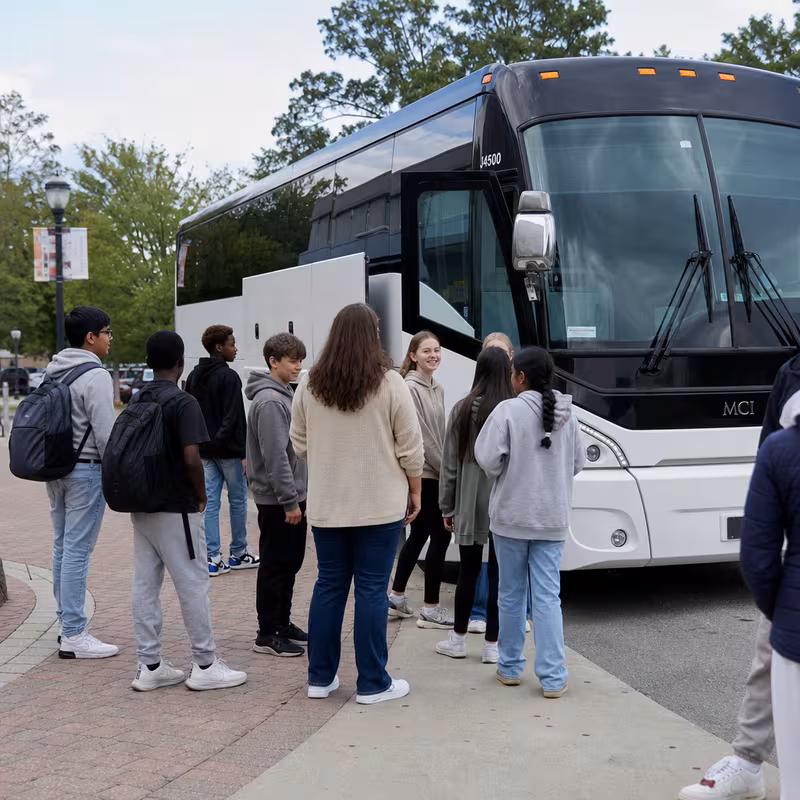 Black Mercedes Sprinter van staged for an Morristown School Transportation group