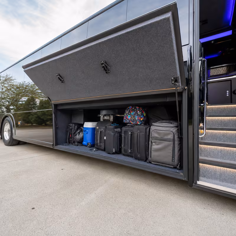 Party bus interior with wraparound leather seating and LED lighting in Morristown
