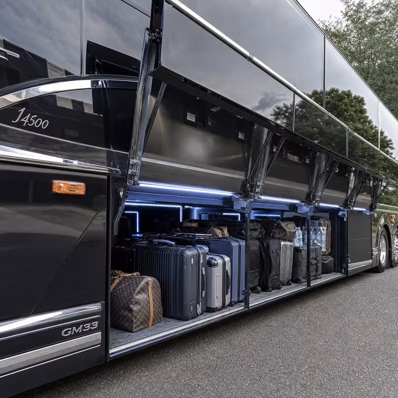 Party bus interior with wraparound leather seating and LED lighting in Morristown